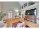 Open-concept living area featuring hardwood floors, high ceilings, and abundant natural light at 2132 Cubla Ct, Rock Hill, SC 29732