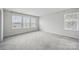 Bedroom with carpet floor and two windows at 223 Haddonsfield Dr, Mooresville, NC 28115