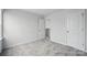 Bedroom featuring neutral walls, carpet, and doorway at 223 Haddonsfield Dr, Mooresville, NC 28115