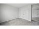 Cozy bedroom features neutral walls, carpet, and closet at 223 Haddonsfield Dr, Mooresville, NC 28115
