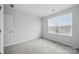 Bedroom featuring neutral walls, carpet, and window with blinds at 223 Haddonsfield Dr, Mooresville, NC 28115