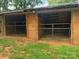 Open animal shelter has a pair of stalls with metal gates at 2932 Rant Drum Rd, Maiden, NC 28650
