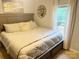 Comfortable bedroom features soft bedding, ample natural light, and calming decor, ideal for restful nights at 2932 Rant Drum Rd, Maiden, NC 28650