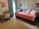 Cozy bedroom with a daybed, desk, and decorative accents, creating a comfortable and stylish space at 2932 Rant Drum Rd, Maiden, NC 28650