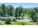Charming home with pond view, set among mature trees and a spacious green lawn at 2932 Rant Drum Rd, Maiden, NC 28650
