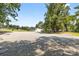 Gravel area in front of the home has large trees that provide shade at 2932 Rant Drum Rd, Maiden, NC 28650