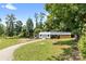 Outdoor view of a well kept farm with outbuildings and a trailer at 2932 Rant Drum Rd, Maiden, NC 28650