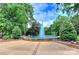 Beautiful park fountain with lush foliage and blue skies above at 301 W 10Th St # 404, Charlotte, NC 28202