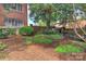 Professionally landscaped garden and brickwork detail on property at 301 W 10Th St # 404, Charlotte, NC 28202
