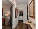 Elegant hallway featuring hardwood floors, decorative art, and classic architectural details, creating a welcoming atmosphere at 301 W 10Th St # 404, Charlotte, NC 28202