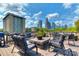 Spacious rooftop deck with comfortable seating and dining areas, offering captivating city skyline views at 301 W 10Th St # 404, Charlotte, NC 28202