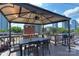 Inviting rooftop deck with shaded dining area offering stunning city views, perfect for outdoor entertaining at 301 W 10Th St # 404, Charlotte, NC 28202