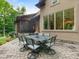 Exterior patio with stone pavers featuring a stone table and seating at 3394 Rainbow Dr, Waxhaw, NC 28173