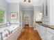 Bright and spacious bathroom with a soaking tub, dual vanities, and elegant fixtures at 3394 Rainbow Dr, Waxhaw, NC 28173