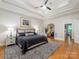 Spacious primary bedroom featuring hardwood floors, a ceiling fan, and a tranquil ambiance at 3394 Rainbow Dr, Waxhaw, NC 28173
