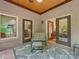 Inviting screened-in porch with ceiling fan, tiled floors, and access to the outdoors and rooms at 3394 Rainbow Dr, Waxhaw, NC 28173