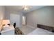 Carpeted bedroom has a large closet, and a ceiling fan for extra comfort at 3633 Longpond Ln, Monroe, NC 28110
