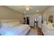 Bedroom featuring a walk-in closet and neutral color palette at 3633 Longpond Ln, Monroe, NC 28110
