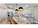 Modern kitchen featuring stainless steel appliances, granite countertops, and stylish pendant lighting at 3633 Longpond Ln, Monroe, NC 28110