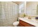 Bathroom featuring a vanity, toilet, and shower with patterned curtain at 4009 Oxford Mill Rd, Waxhaw, NC 28173