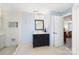 Bright bathroom featuring walk-in shower and vanity with storage at 4009 Oxford Mill Rd, Waxhaw, NC 28173