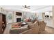 Open concept living room with a fireplace and large sectional sofa at 4009 Oxford Mill Rd, Waxhaw, NC 28173