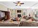 Inviting living room featuring a fireplace, TV, and comfortable sectional at 4009 Oxford Mill Rd, Waxhaw, NC 28173