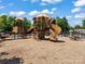 Fun-filled community playground with slides and climbing structures next to the pool at 4009 Oxford Mill Rd, Waxhaw, NC 28173