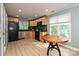 Bright kitchen with stainless steel appliances, ample cabinet space, and a breakfast table at 433-68 W 8Th St, Charlotte, NC 28202