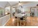 Bright kitchen featuring a large center island with barstool seating at 5104 Top Seed Ct, Charlotte, NC 28226