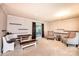 Open living space showcasing a dining area with table and bench, and comfortable chairs at 5516 Northwood Dr, Hickory, NC 28601