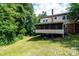 Exterior view of the home's backyard, including a screened-in porch at 5516 Northwood Dr, Hickory, NC 28601