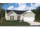 Charming one-story home with stone accents, a two-car garage, and a well-manicured front lawn at 6520 Alanbrook Rd, Charlotte, NC 28215