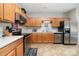 Efficient kitchen with stainless steel appliances and stylish backsplash at 7012 Somerset Springs Dr # E, Charlotte, NC 28262