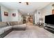 Inviting living room boasts an open floor plan leading to the kitchen at 7012 Somerset Springs Dr # E, Charlotte, NC 28262