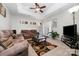 Spacious living room featuring neutral tones and plenty of seating at 7012 Somerset Springs Dr # E, Charlotte, NC 28262