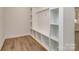 Mudroom boasts built-in bench with storage cubbies and coat hooks at 7108 Hambright Rd, Huntersville, NC 28078