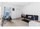 Bright bedroom featuring neutral carpet, a large window, and ample closet space at 7138 Somerset Springs Dr, Charlotte, NC 28262