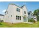 Two-story home showcasing white siding, a manicured lawn and a bright blue sky at 720 Flare Dr, Tega Cay, SC 29708