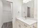 New bathroom with a modern vanity, framed mirror and fixtures, and a door to a closet at 925 4Th St, Statesville, NC 28677