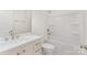 Bright white bathroom with sleek vanity, modern fixtures, and a clean, inviting tub/shower combo at 925 4Th St, Statesville, NC 28677