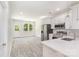 Modern kitchen featuring stainless steel appliances, white cabinetry, and bright natural light at 925 4Th St, Statesville, NC 28677