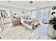 Cozy bedroom with natural light, neutral tones, and a glimpse of the adjoining bathroom at 9419 Silverdale Ln, Charlotte, NC 28269
