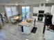 Bright kitchen boasts granite counters, stainless appliances, kitchen island, and an eat-in dining area at 9419 Silverdale Ln, Charlotte, NC 28269