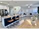 Modern open concept kitchen featuring a large island, breakfast bar and stainless steel appliances at 9419 Silverdale Ln, Charlotte, NC 28269