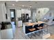 Modern open concept kitchen with a large island, granite countertops, and stainless steel appliances at 9419 Silverdale Ln, Charlotte, NC 28269
