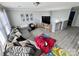 Inviting living room featuring a comfortable sectional sofa and playful decor at 9419 Silverdale Ln, Charlotte, NC 28269