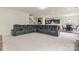 Expansive living area featuring plush seating and an open floor plan concept at 966 Nw Parkland Pl, Concord, NC 28027