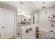Elegant bathroom with a modern shower, dual sink vanity, and sleek design elements at 9864 Quercus Ln, Huntersville, NC 28078