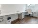 Features a long desk with built-in cabinets and natural light at 1005 Willow Bank Ln, Belmont, NC 28012
